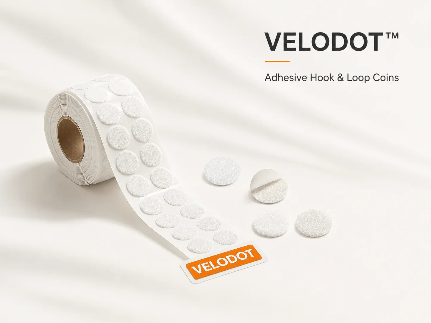 Velodot hook and loop coins for apparel adjustment zones